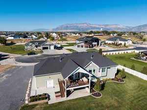 Aerial perspective of suburban area featuring a mountain backdrop
