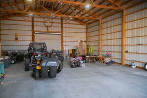 Garage featuring metal wall
