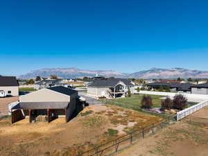 View of mountain background featuring nearby suburban area