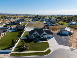 Aerial view of residential area featuring a mountain backdrop