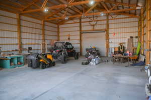 Garage featuring metal wall