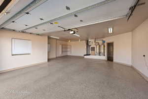 Garage featuring water heater