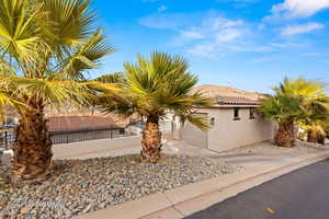 View of front of house with stucco siding