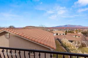 View of mountain backdrop with nearby suburban area