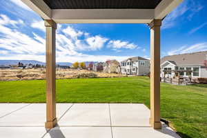 View of patio featuring a pergola and a residential view