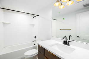 Full bath with shower / bathtub combination and vanity