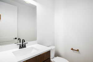 Bathroom with vanity and toilet