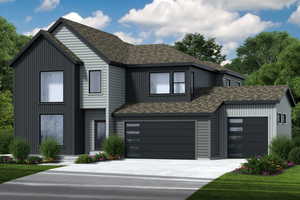 View of front of property with concrete driveway