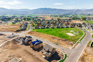 Aerial view of residential area with a mountainous background