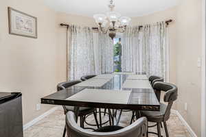 Dining space featuring a chandelier