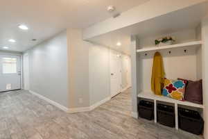 Hallway to bedrooms and exit to backyard