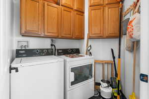 Laundry room with cabinets