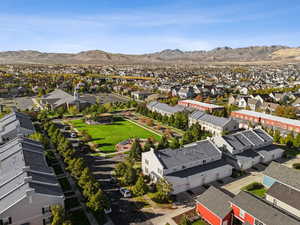 Aerial perspective of suburban area with a mountainous background