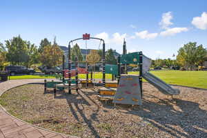 Communal playground featuring a yard