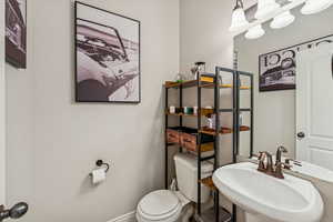 Bathroom with toilet and a sink