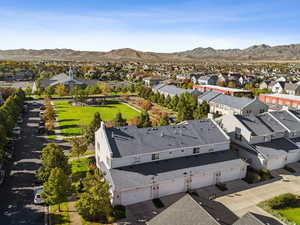 Aerial view of residential area featuring mountains