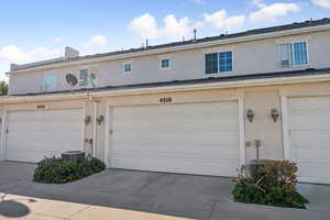 Garage featuring driveway