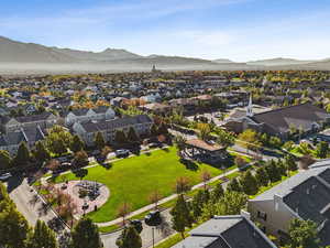 Aerial perspective of suburban area featuring a mountainous background