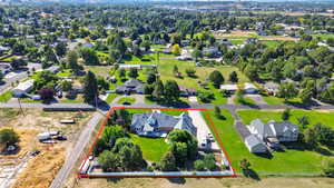 Aerial view of residential area with property parcel outlined