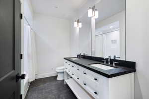 Bathroom featuring double vanity