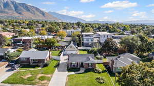 Aerial view of residential area featuring mountains
