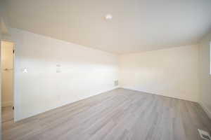 Empty room featuring light wood-style floors