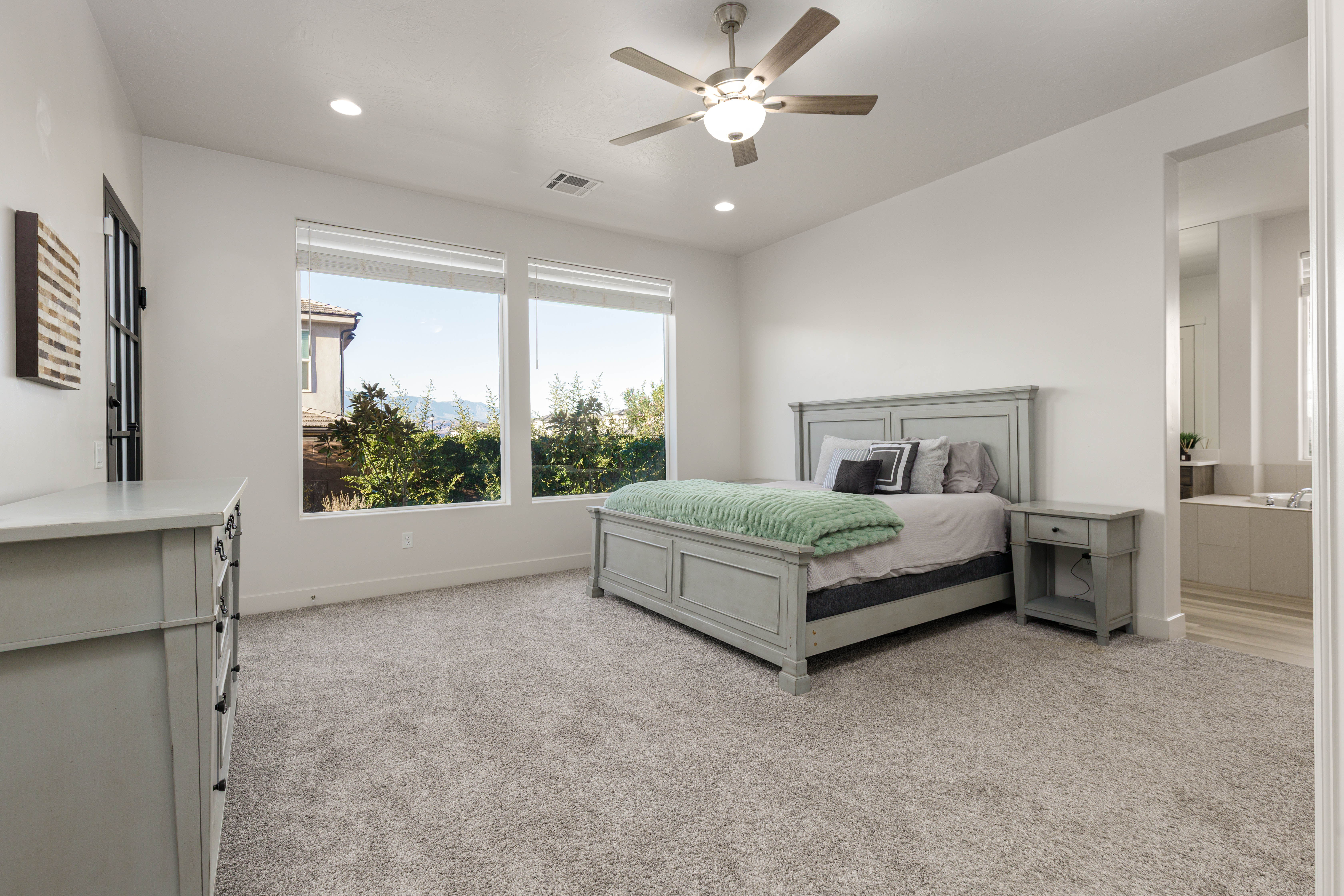 Very spacious Owners Suite with over sized pictures windows viewing Pine Valley Mountain.