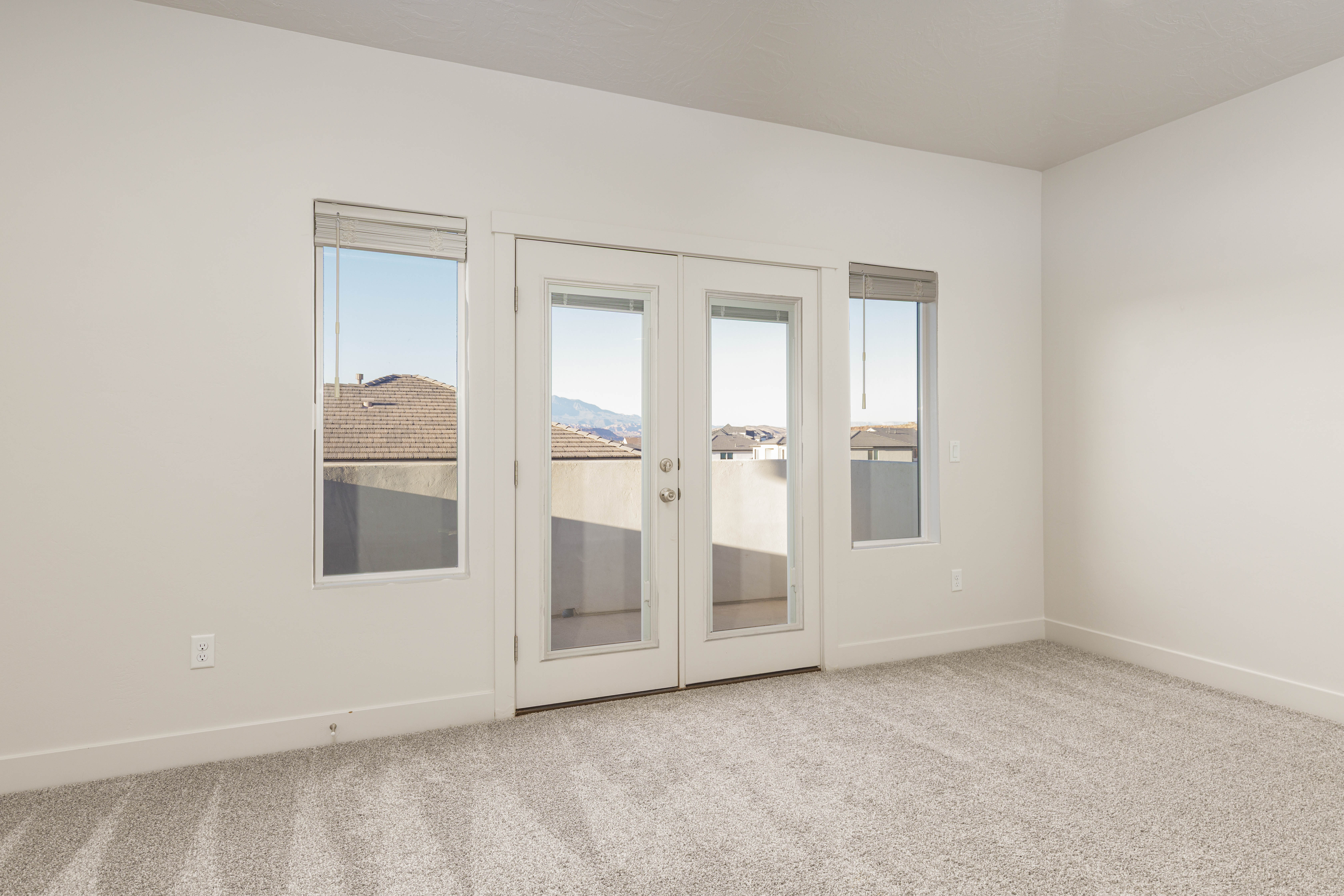 Family room french doors out to the balcony.