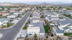 Aerial view of residential area with a mountainous background