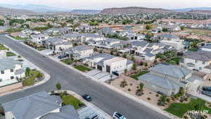 Aerial view of residential area featuring a mountain backdrop