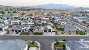 Aerial view of residential area with a mountain backdrop