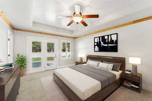 Bedroom with a tray ceiling, access to outside, light colored carpet, ceiling fan, and crown molding