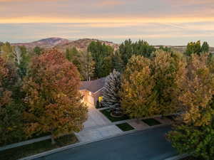 View of subject property with a mountain backdrop