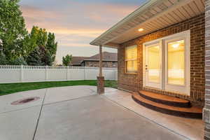 Fenced backyard featuring a patio area