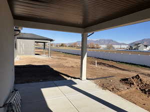 View of patio featuring a mountain view