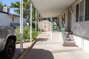Carport, patio, & storage shed