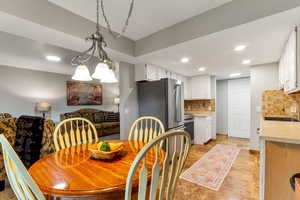 Dining room featuring recessed lighting
