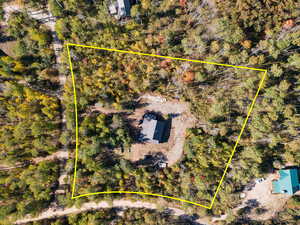 Aerial overview of property's location featuring property boundaries highlighted