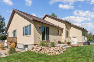 Side Yard with Shed, Water Feature, and Lush Grass, Lot Partially Fenced
