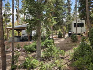 View of yard featuring a gazebo and a patio area