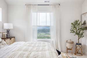 Bedroom featuring baseboards