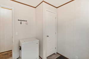 Bathroom featuring crown molding