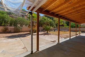 Fenced backyard featuring a patio