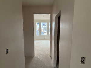 Hall with unfinished concrete floors