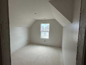Bonus room featuring lofted ceiling