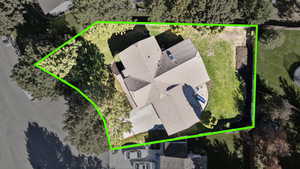 Aerial view of property and surrounding area with property boundaries highlighted