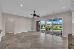 Unfurnished room featuring ceiling fan, recessed lighting, and light tile patterned floors