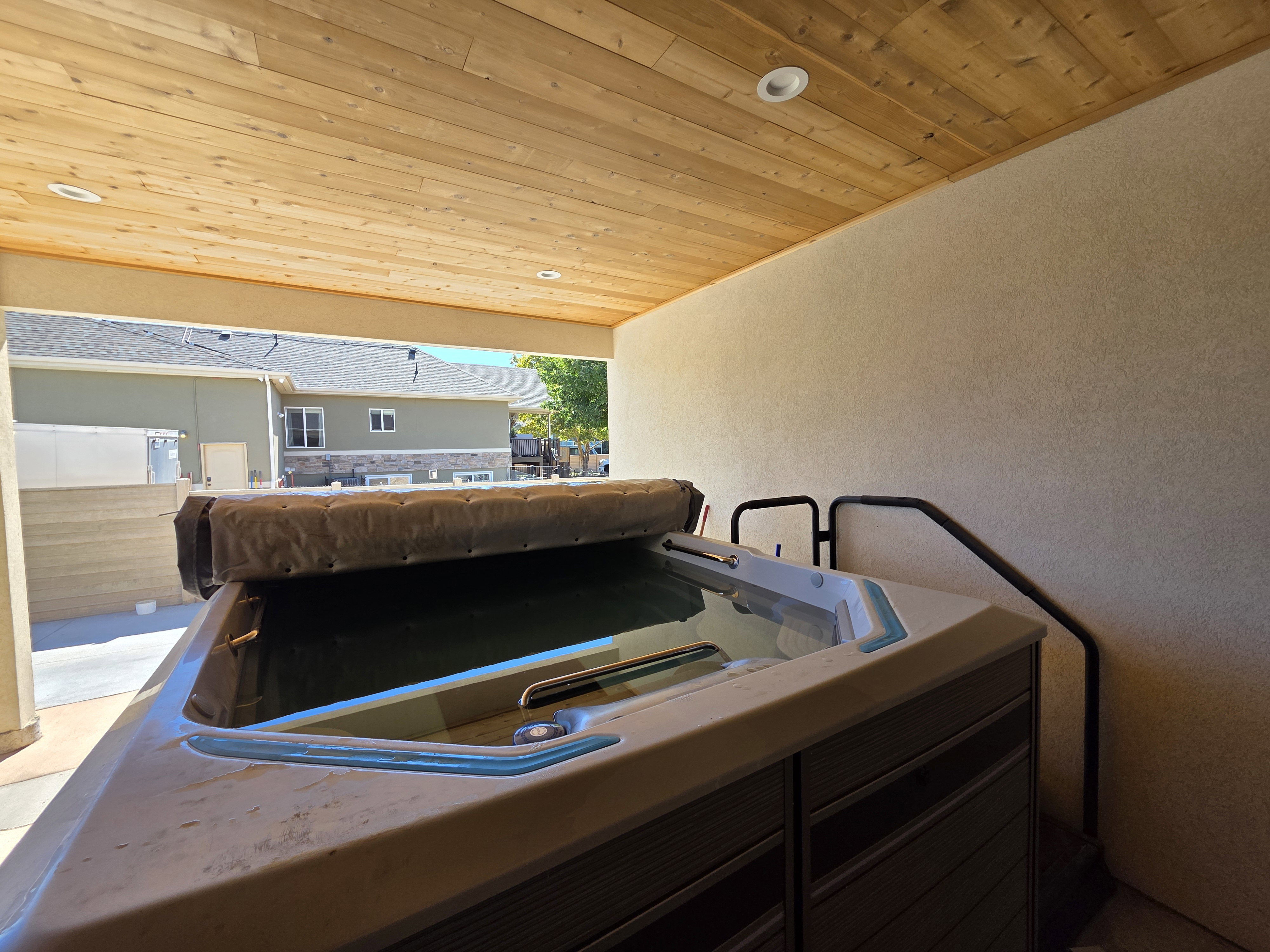 View of patio / terrace featuring a hot tub
