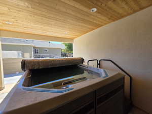 View of patio / terrace featuring a hot tub