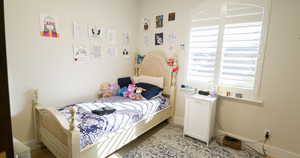 Bedroom with baseboards